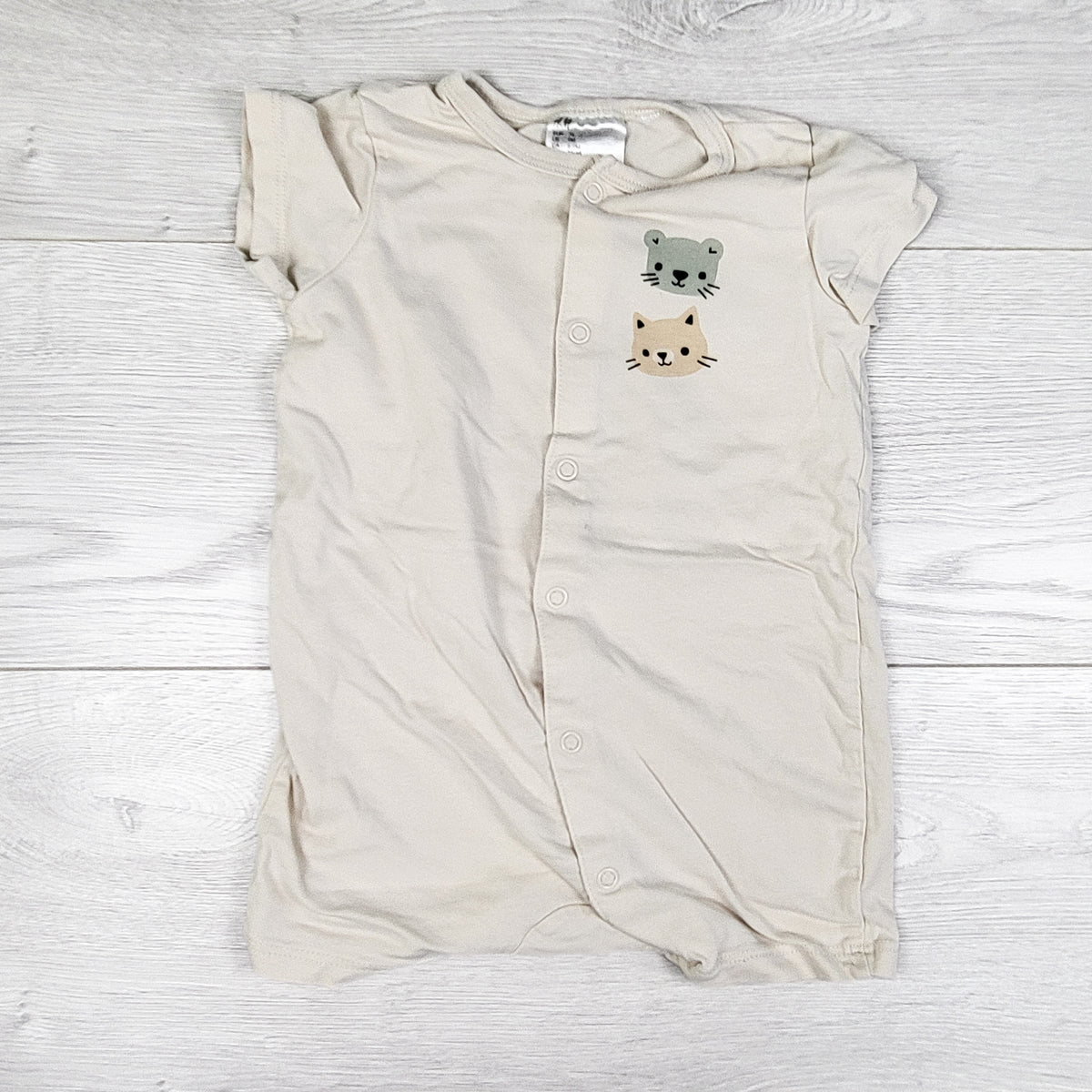 H and M beige romper with cats and bears. Size 6-9 months