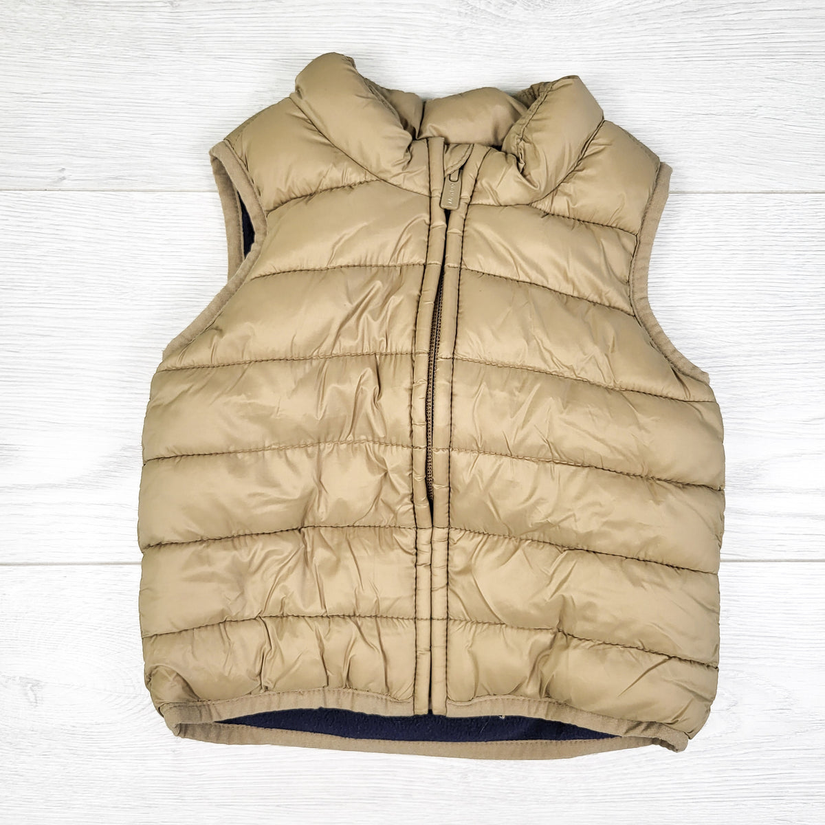 Old Navy beige fleece lined puffer vest. Size 6-12 months