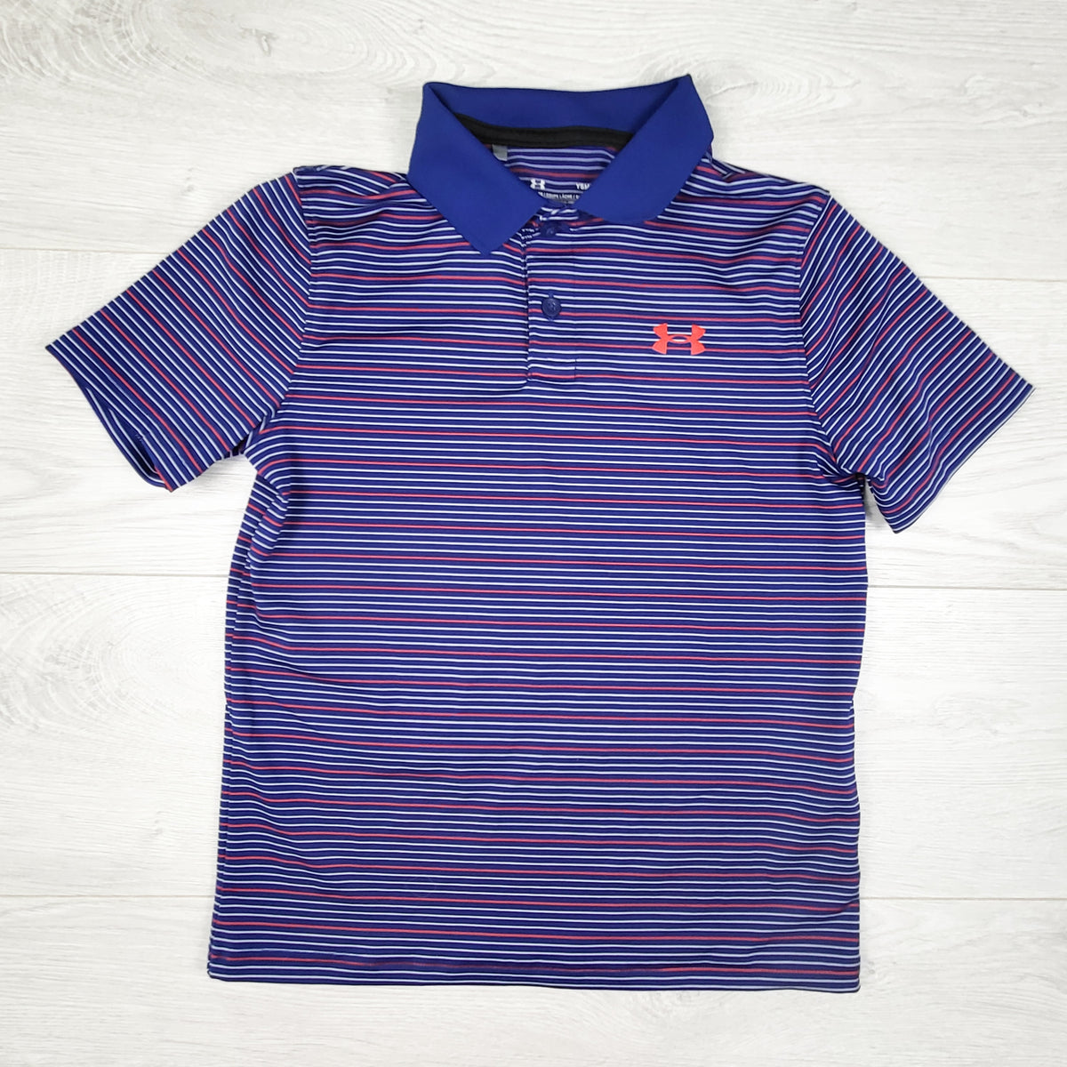 Under Armour blue loose fit striped active polo t-shirt. Size small (7/8)