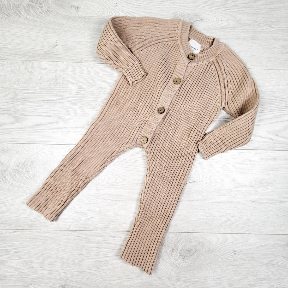 Kindly beige ribbed sweater romper. Approx 6 months