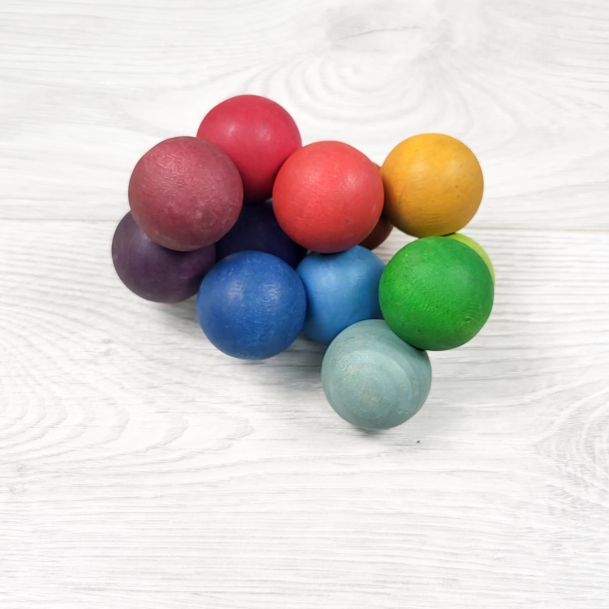 Grimm's wooden rainbow beads grasping toy