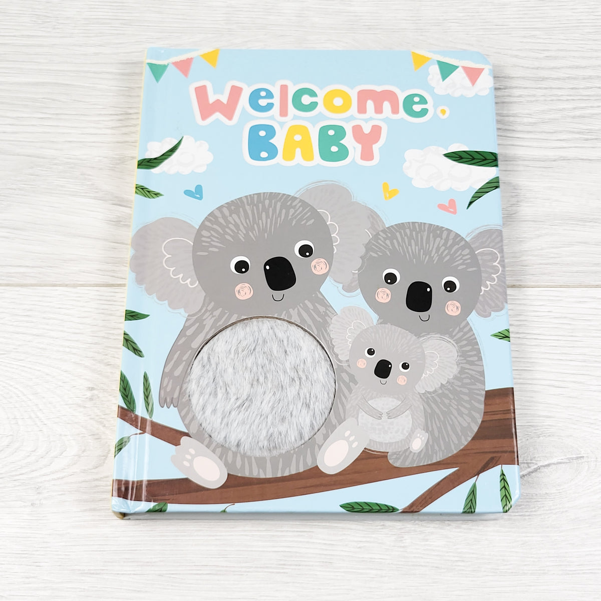 Welcome Baby. Touch and feel board book