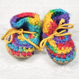 Padraig rainbow sheepskin slippers. Sizes like 6-12 months