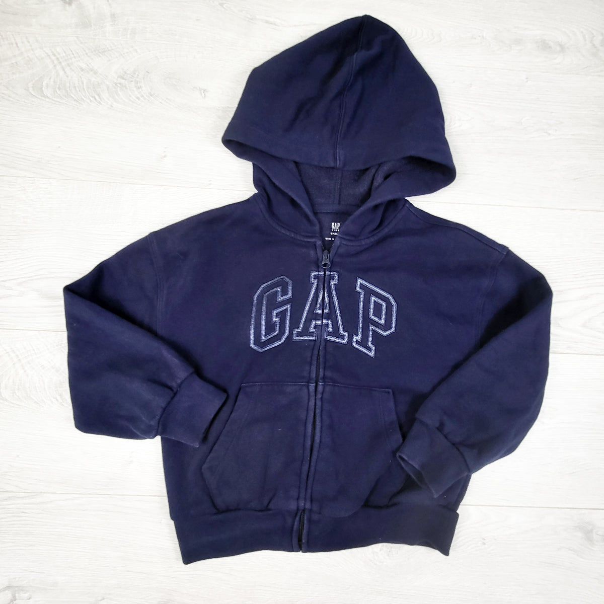 Gap navy fleecy lined zip up hoodie. Size 6/7