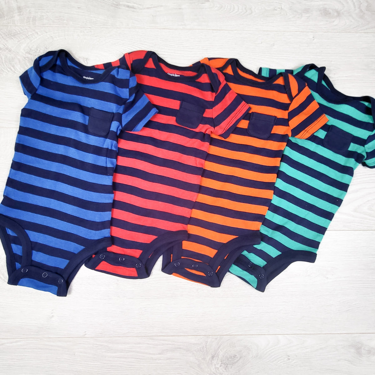 Simple Joys striped 4pc bodysuit set (blue/red/orange/turquoise.) Size 3-6 months