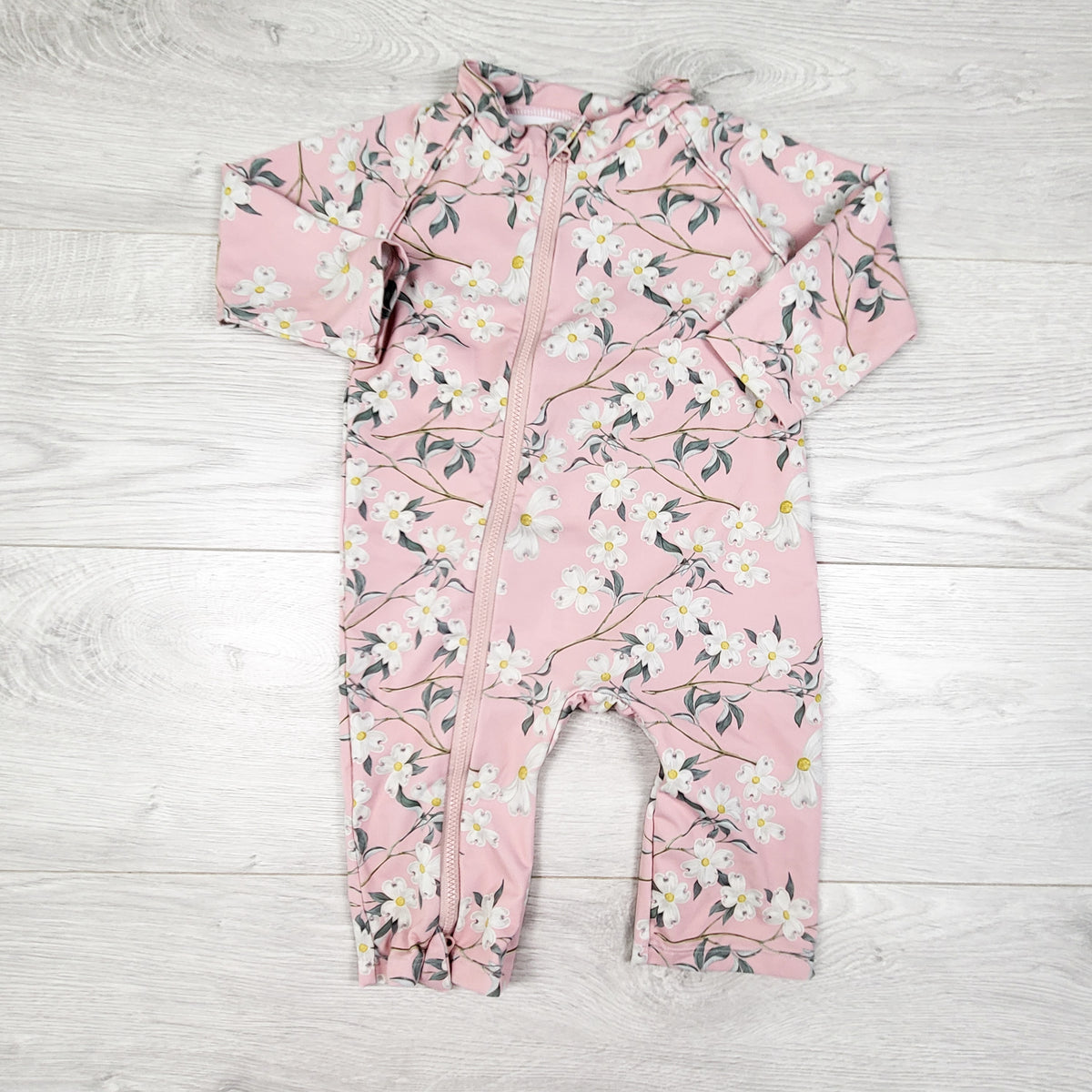 Stonz pink floral print one piece rash guard. Size 6-12 months