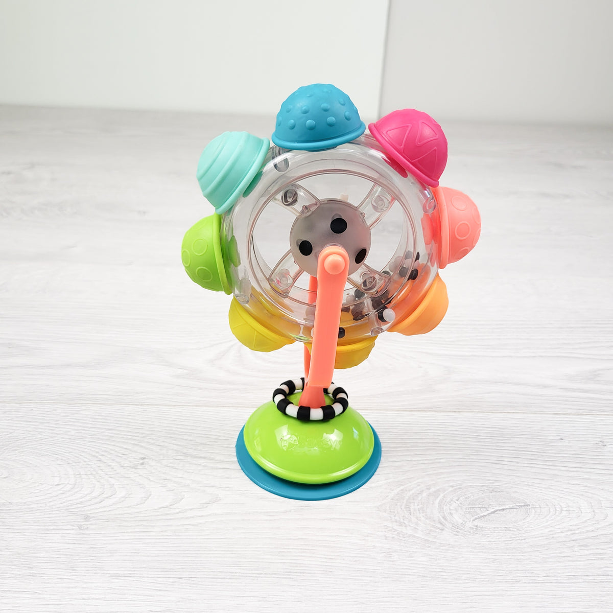 Sassy spinning suction cup toy
