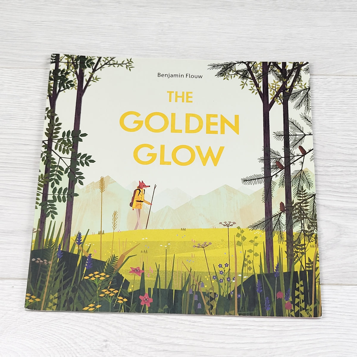 The Golden Glow. Soft cover book