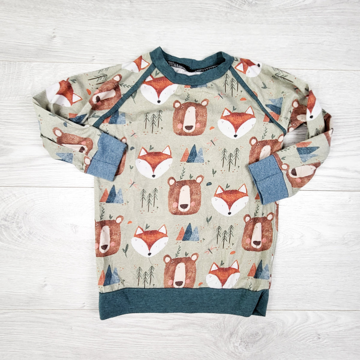 Handmade top with woodland animals. Approx size 4T