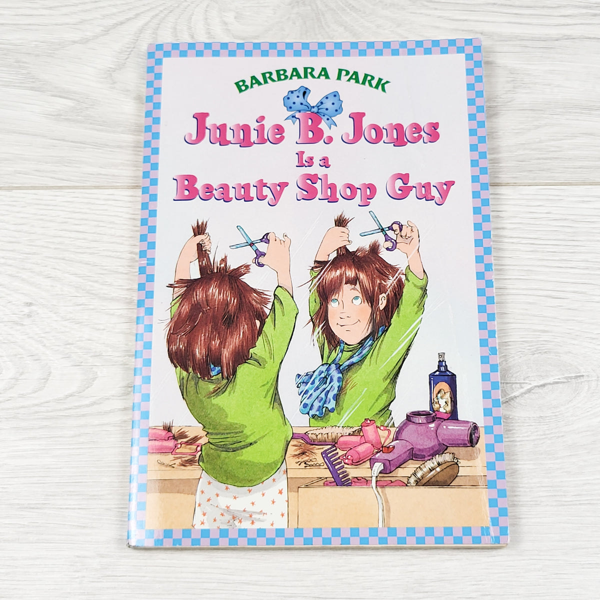 Junie B. Jones is a Beauty Shop Guy. Soft cover chapter book