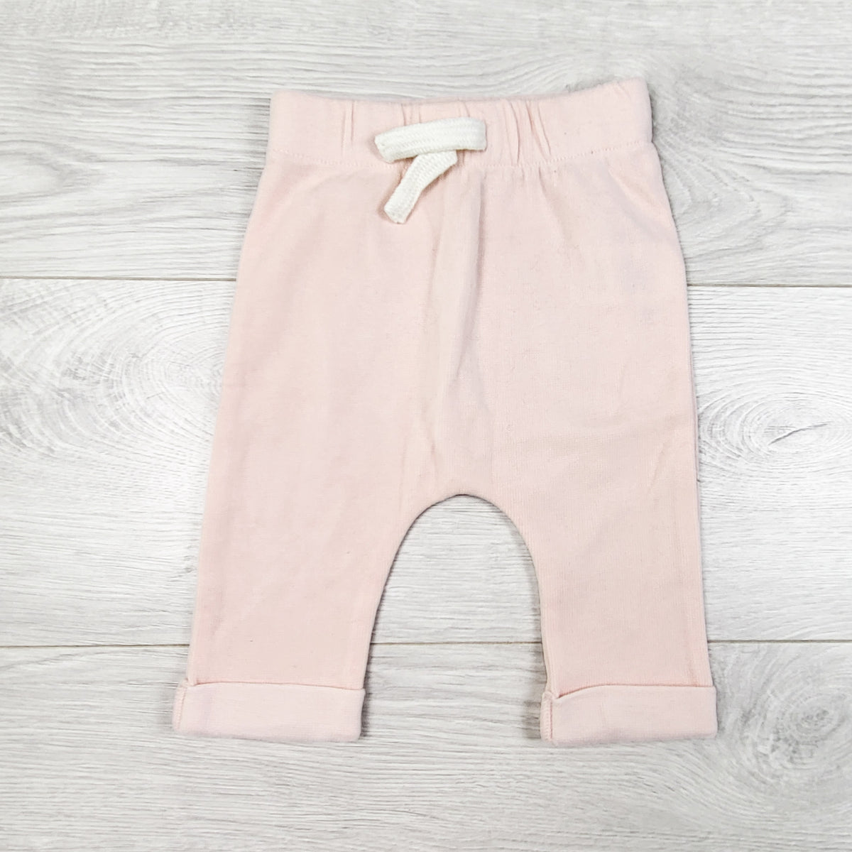 Rise Little Earthling light pink knit pants. Size 3-6 months