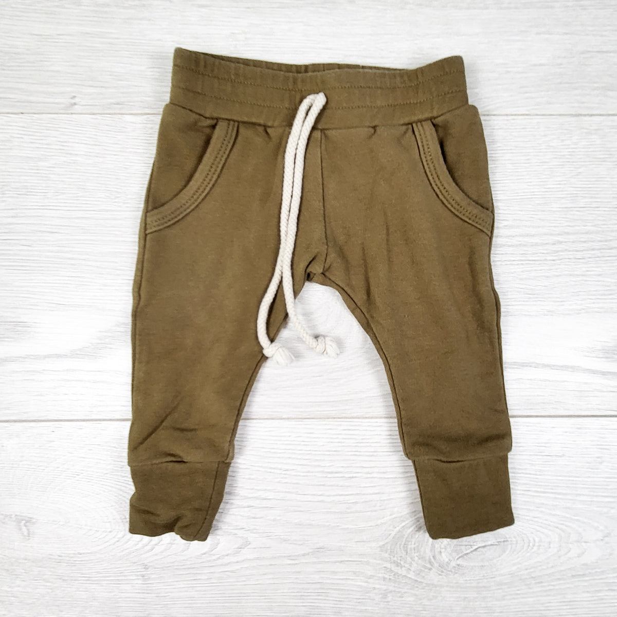 Mebie Baby olive coloured cotton joggers. Size 0-3 months