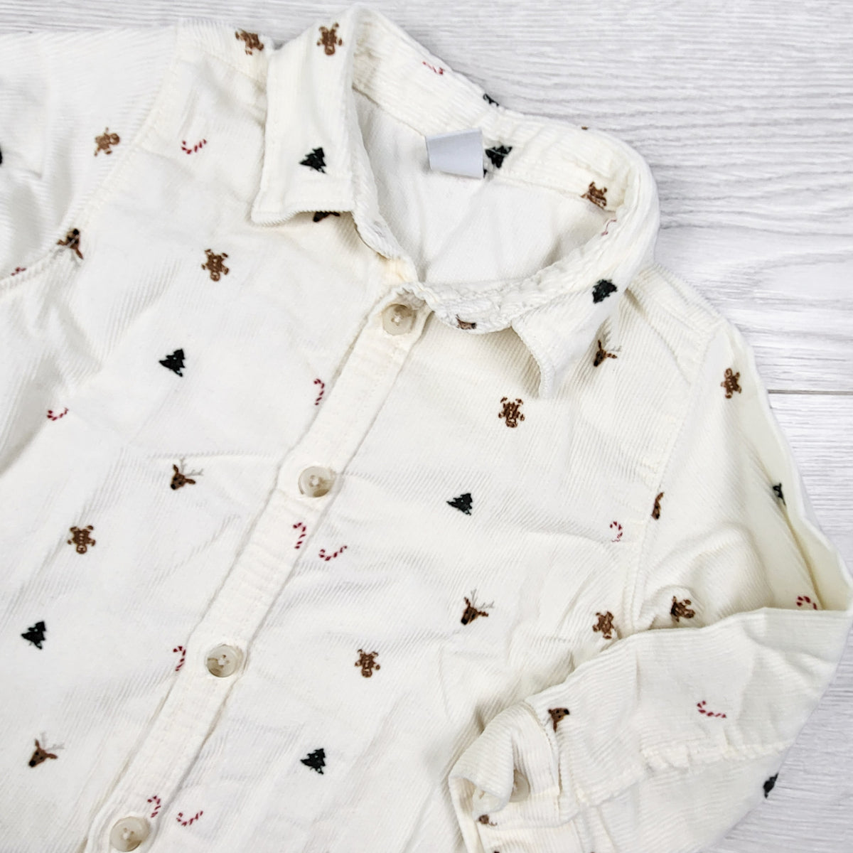 Old Navy cream coloured Christmas themed button down corduroy shirt. Size 18-24 months