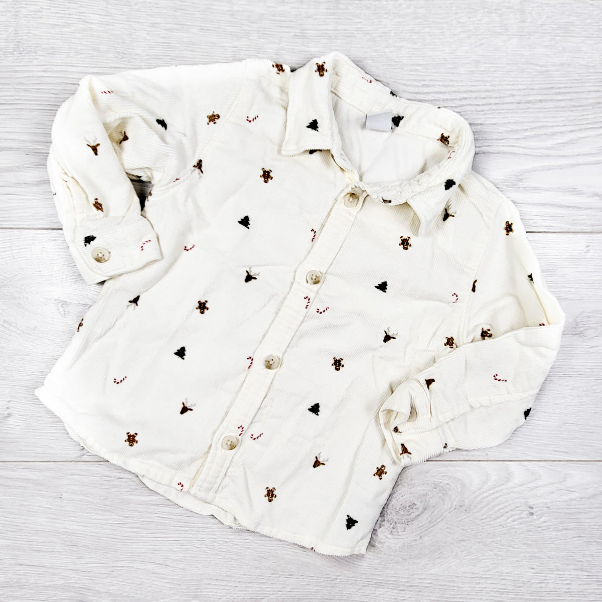 Old Navy cream coloured Christmas themed button down corduroy shirt. Size 18-24 months