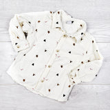 Old Navy cream coloured Christmas themed button down corduroy shirt. Size 18-24 months