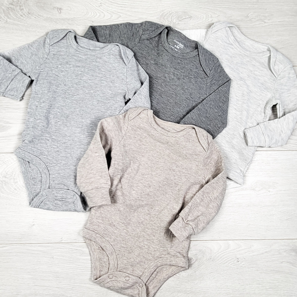 Simple Joys 4-pack waffle knit bodysuit set. Size 6-9 months - AS IS
