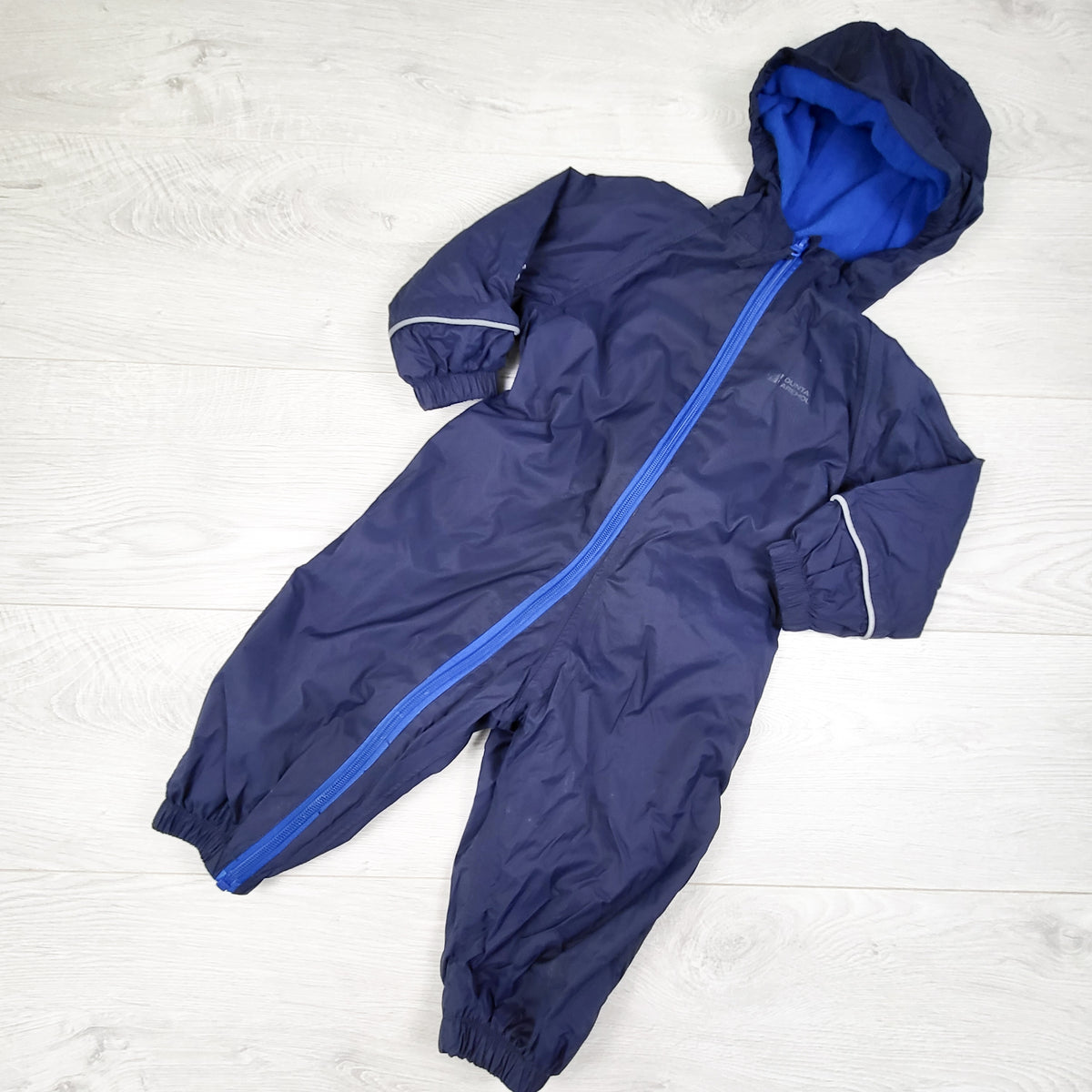 Mountain Warehouse navy fleece lined one piece rain suit. Size 6-12 months