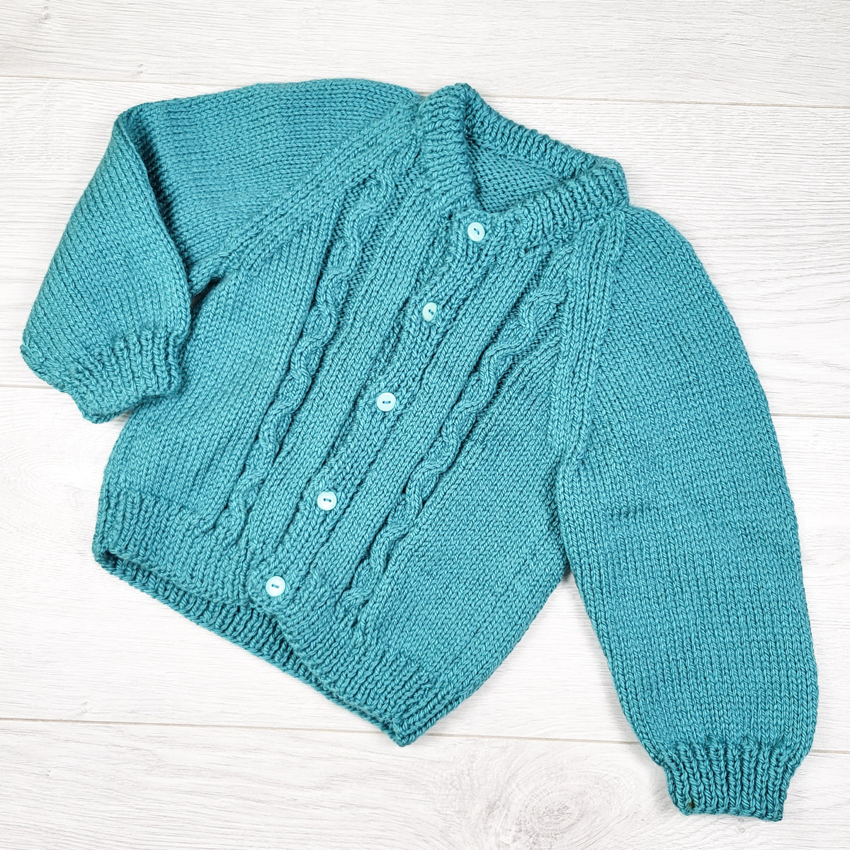 Handmade teal cardigan sweater. Approx size 6-12 months