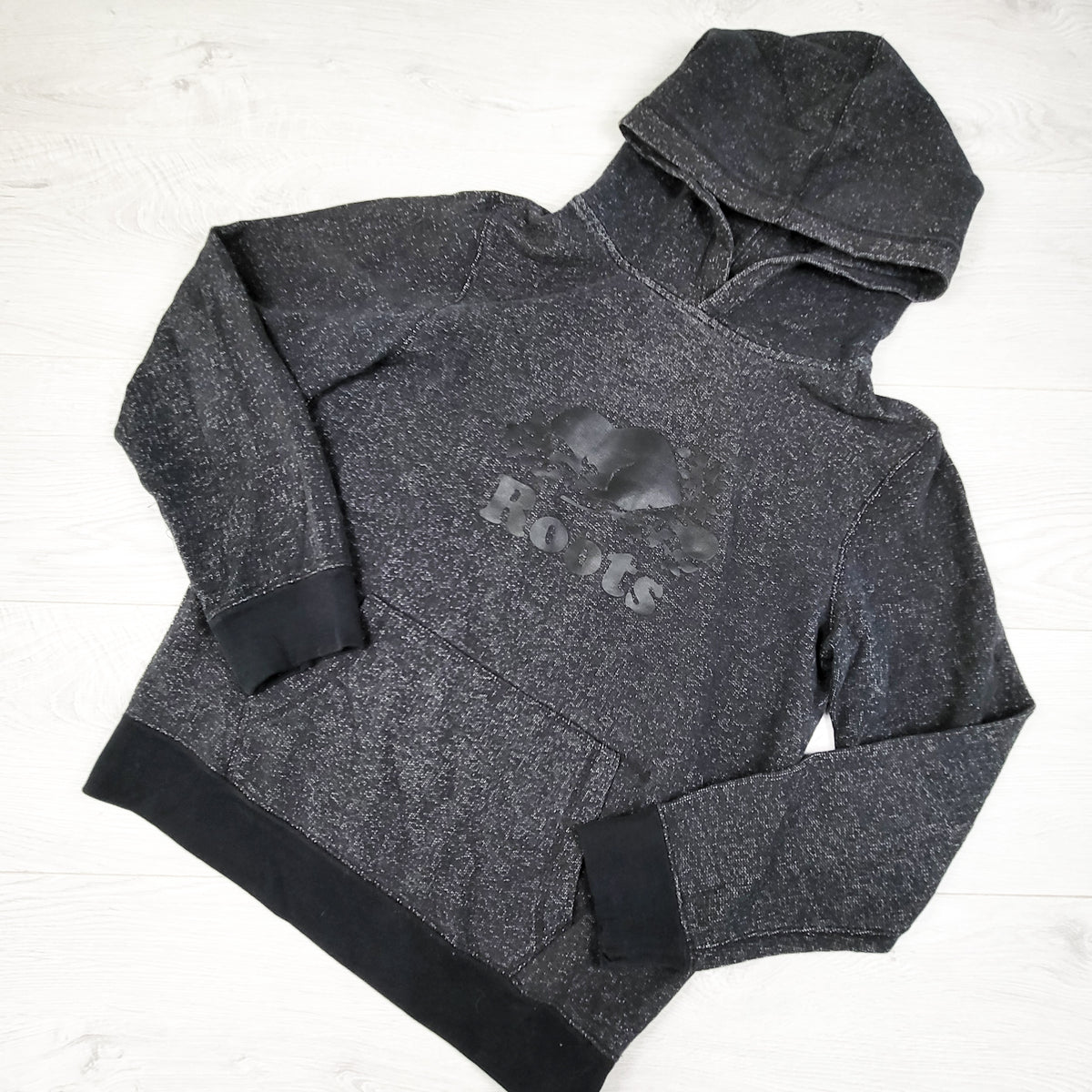 Roots black marled pullover hoodie. Size XXL (13 to 14 years)
