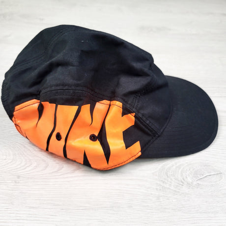 Nike black five panel hat. One size fits most (older kids)