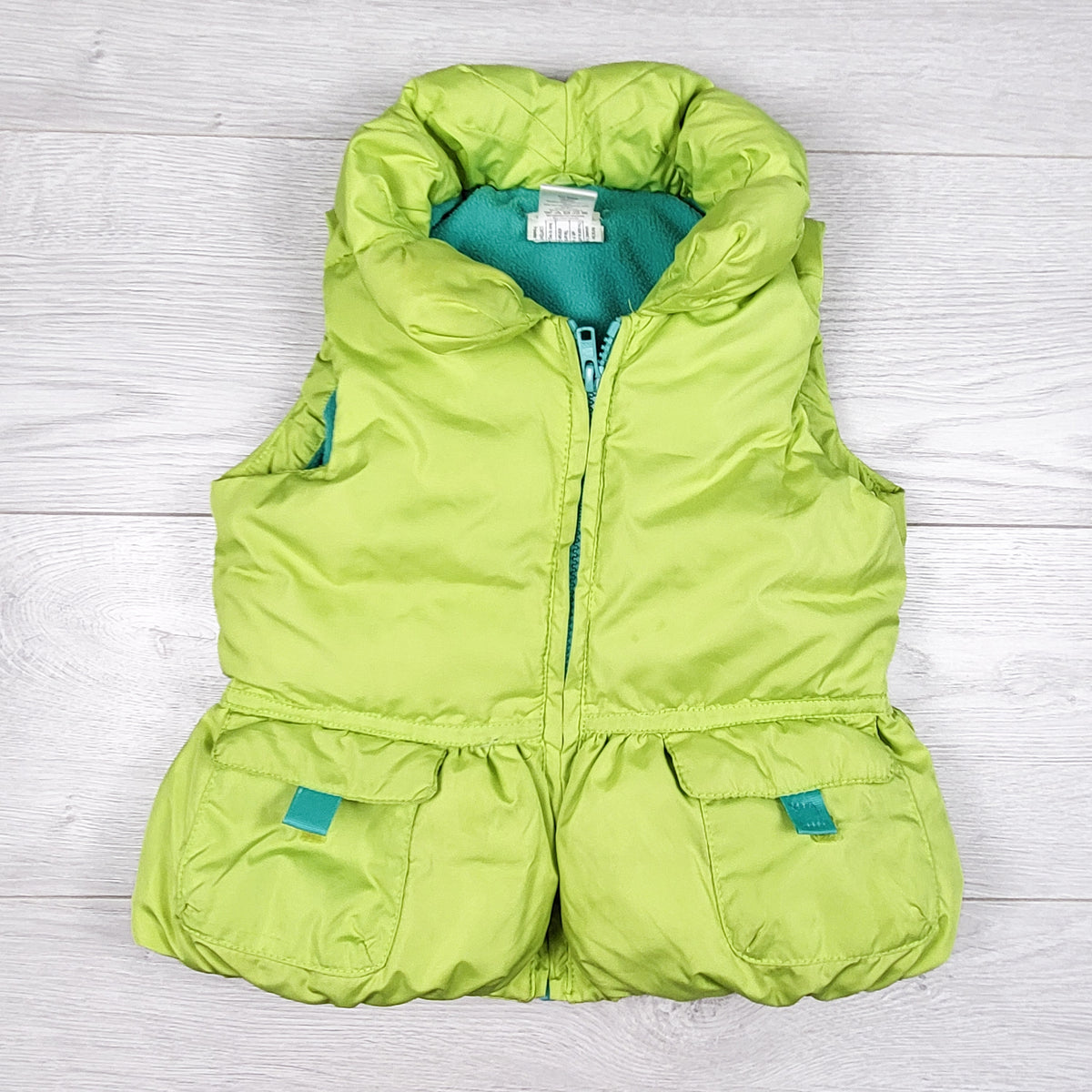 Gymboree lime green fleece lined puffer vest. Size 4T