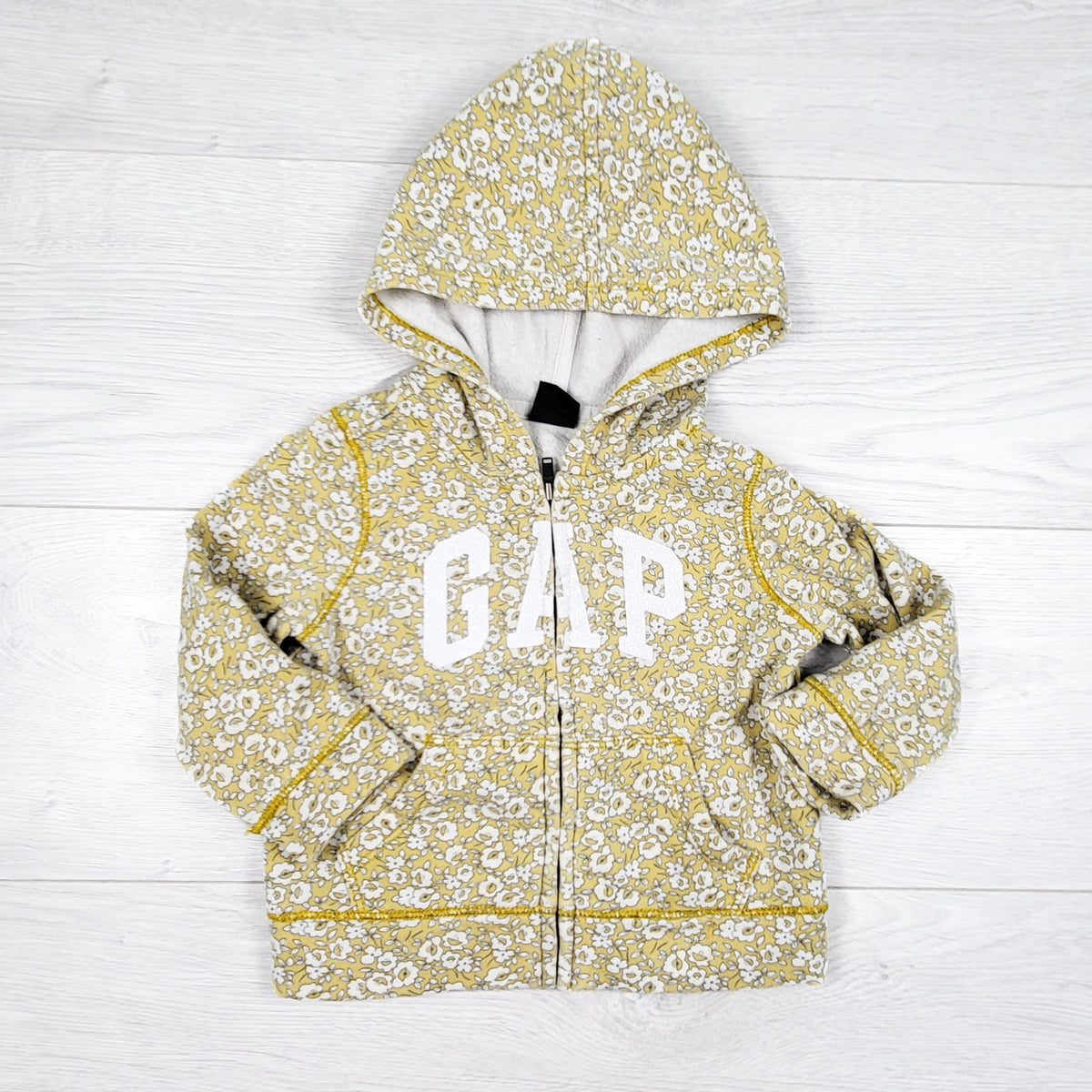 Gap yellow floral print zip up hoodie. Size 12-18 months