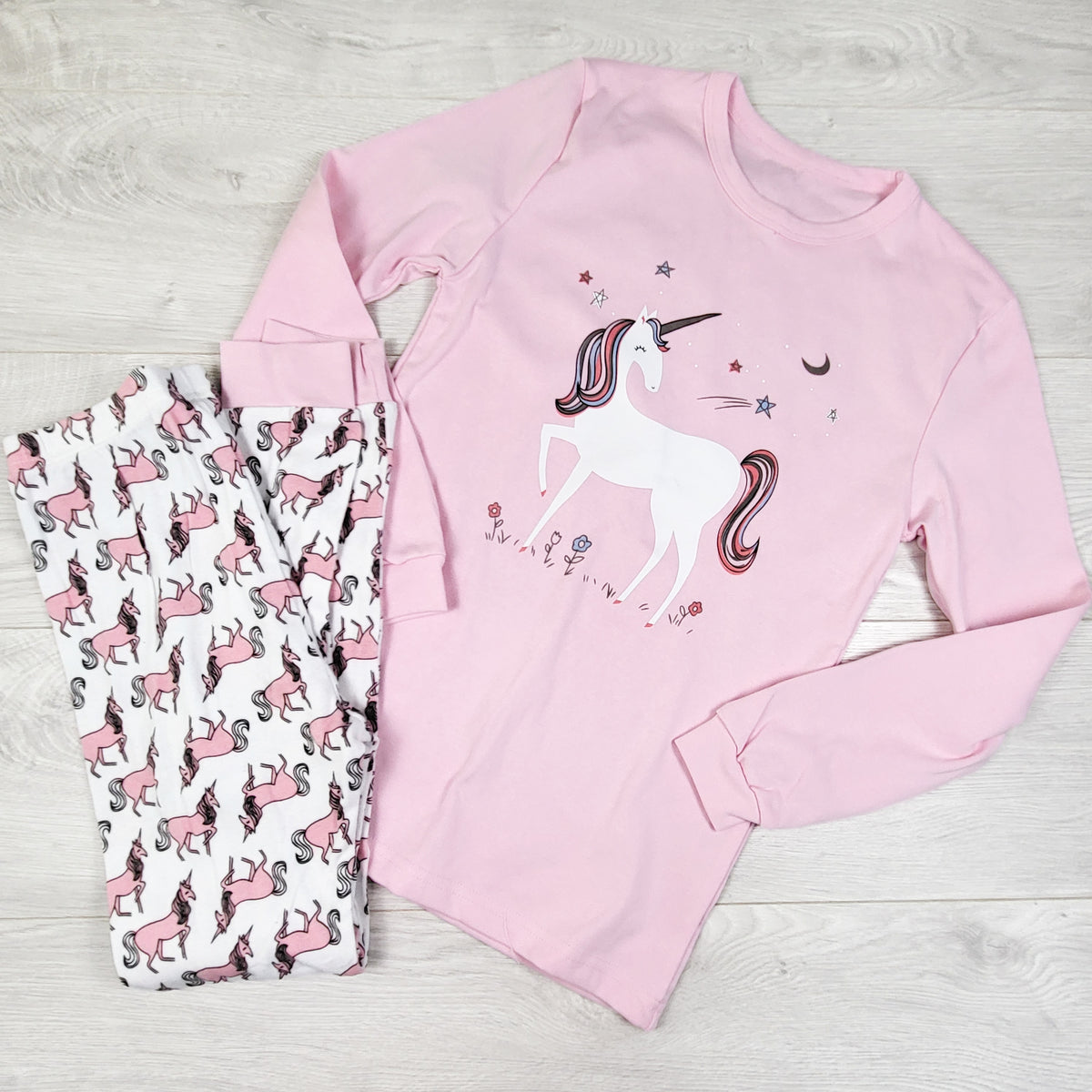 Unbranded pink and white unicorn print 2pc PJs. Size 12