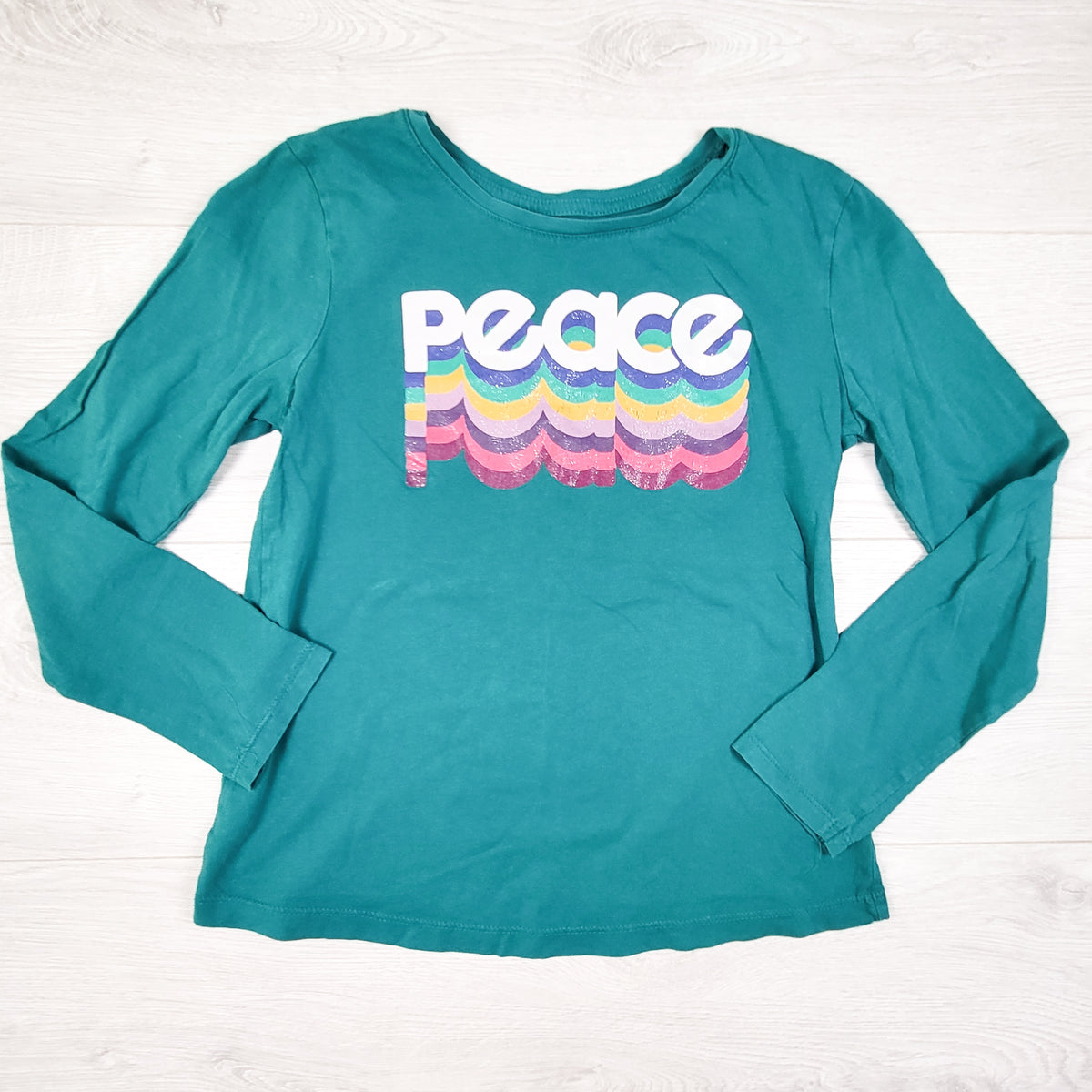 George teal green long sleeve "Peace" shirt. Size 10/12