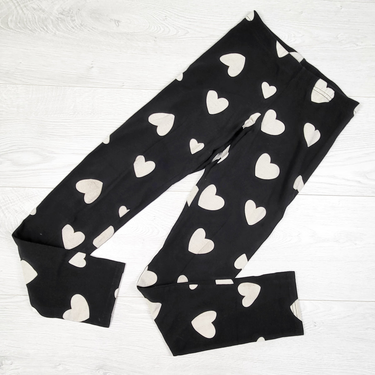 Old Navy black leggings with hearts. Size 14/16