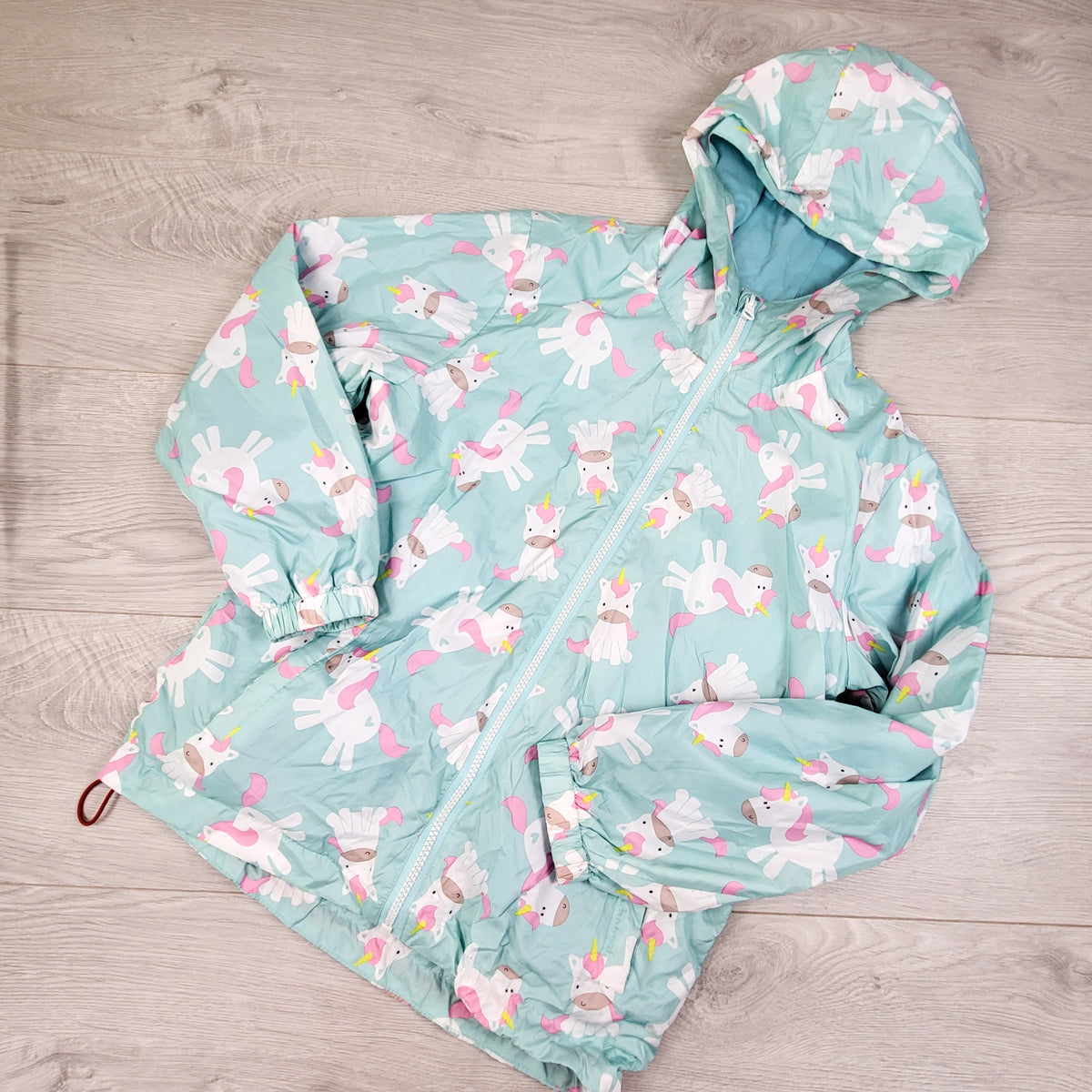 Top and Sky Kids turquoise unicorn print hooded windbreaker jacket. Size 8-10 Years