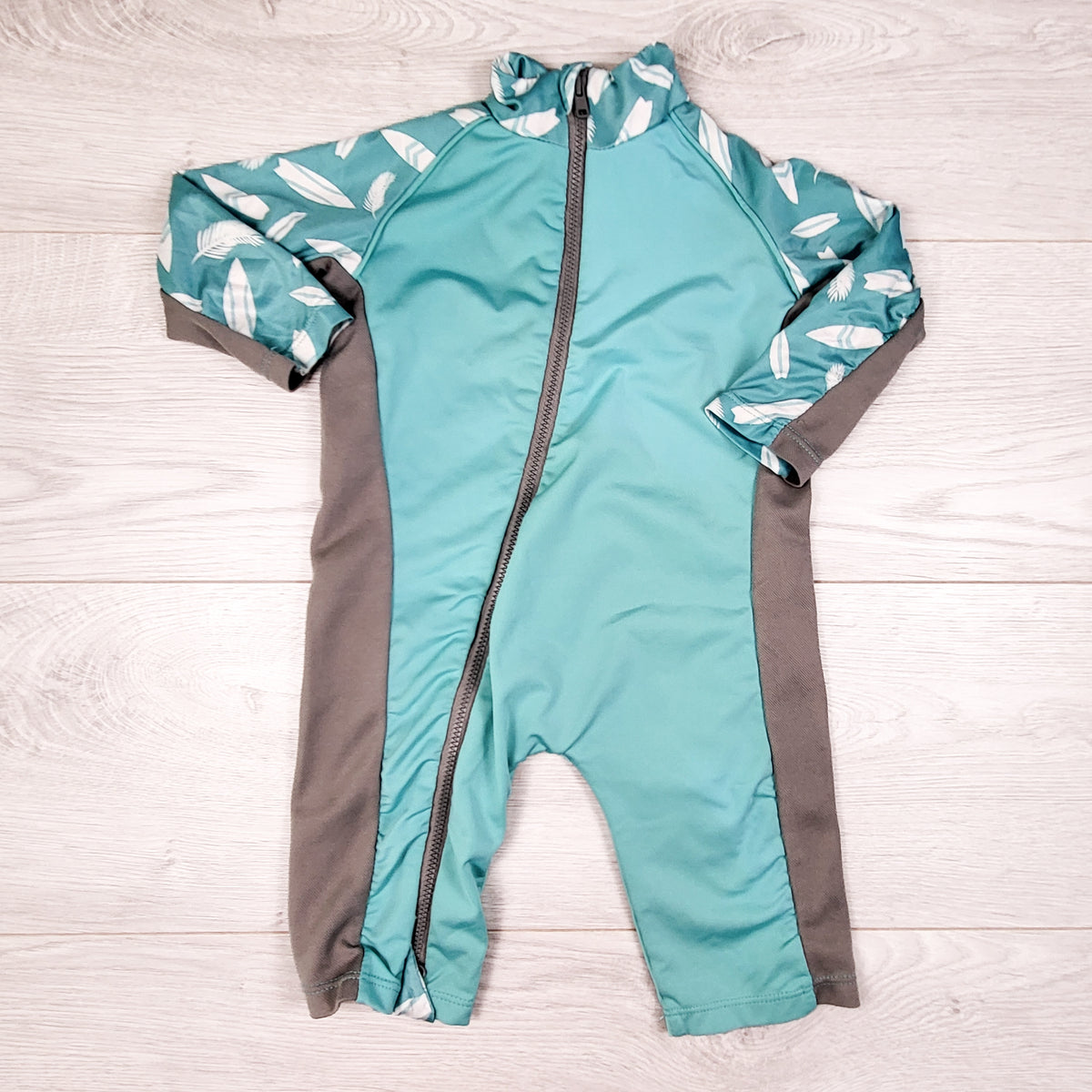 Stonz turquoise and grey one piece rash guard. Size 0-6 months