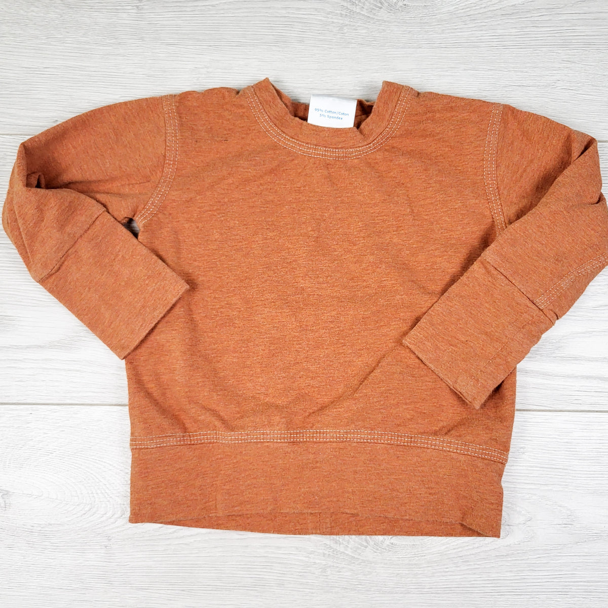 Lavendar Moon Kids orange long sleeve top. Size 3 to 12 months
