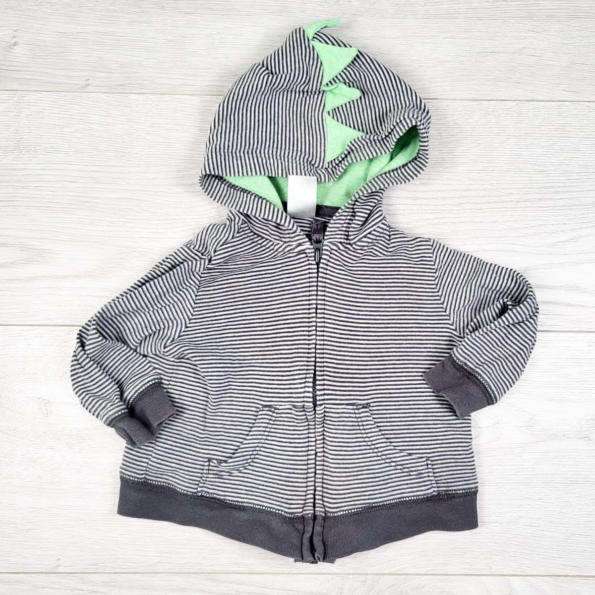 Carters grey striped zip up hoodie with dinosaur spikes. Size 6 months