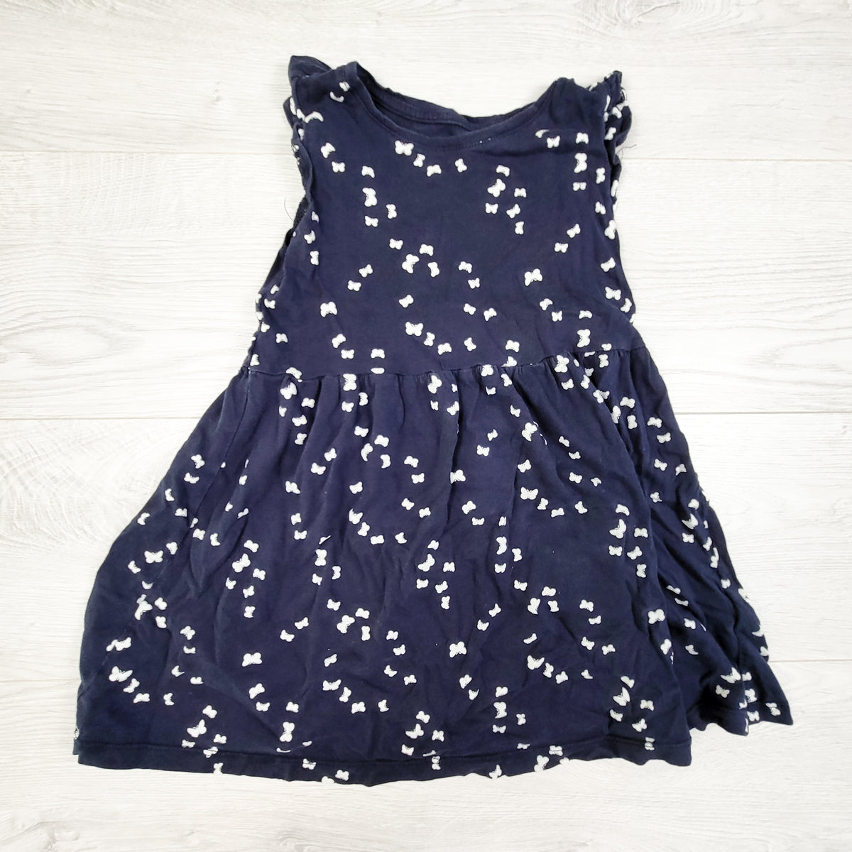 H and M navy organic cotton butterfly print dress. Size 4-6 Years