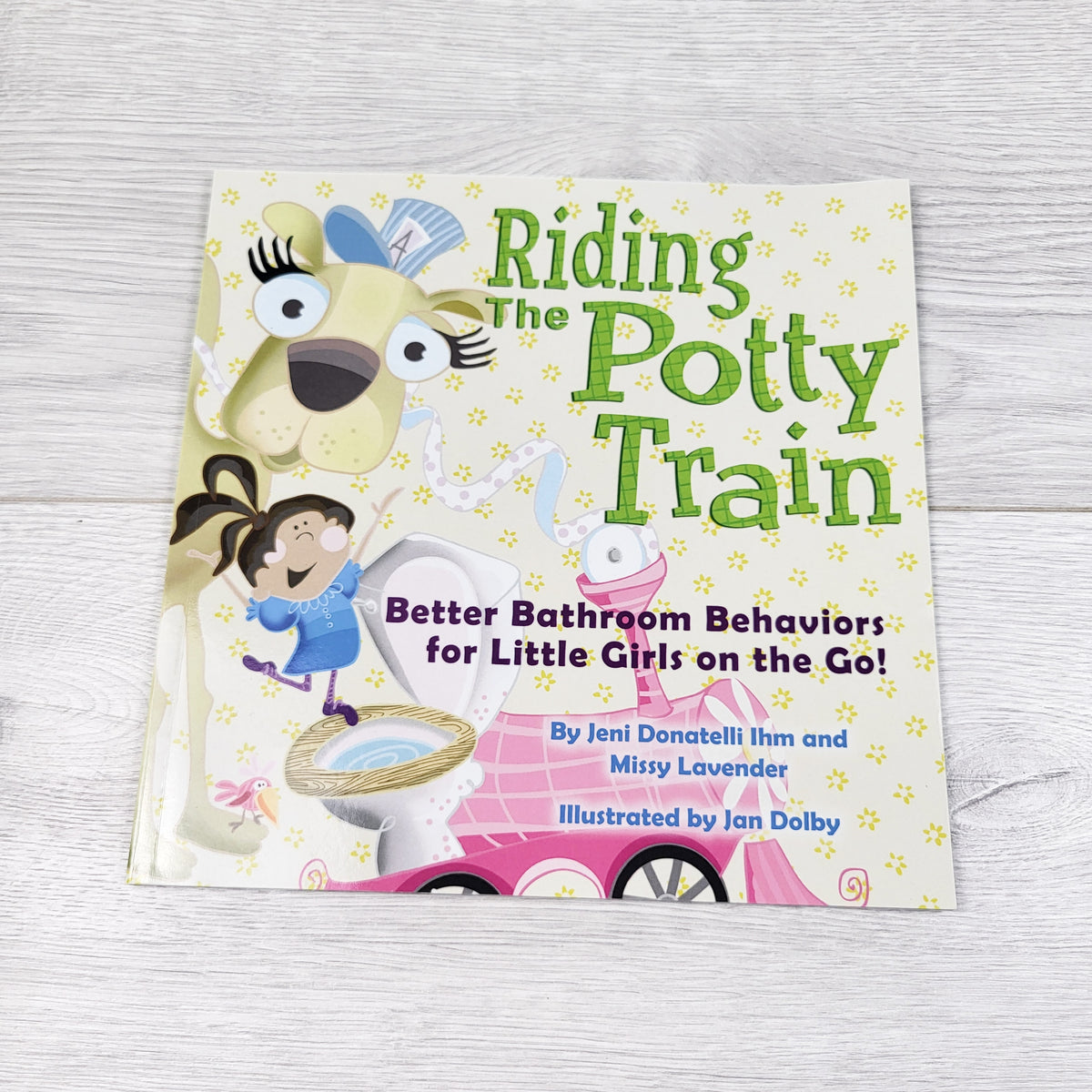 Riding the Potty Train. Soft cover book
