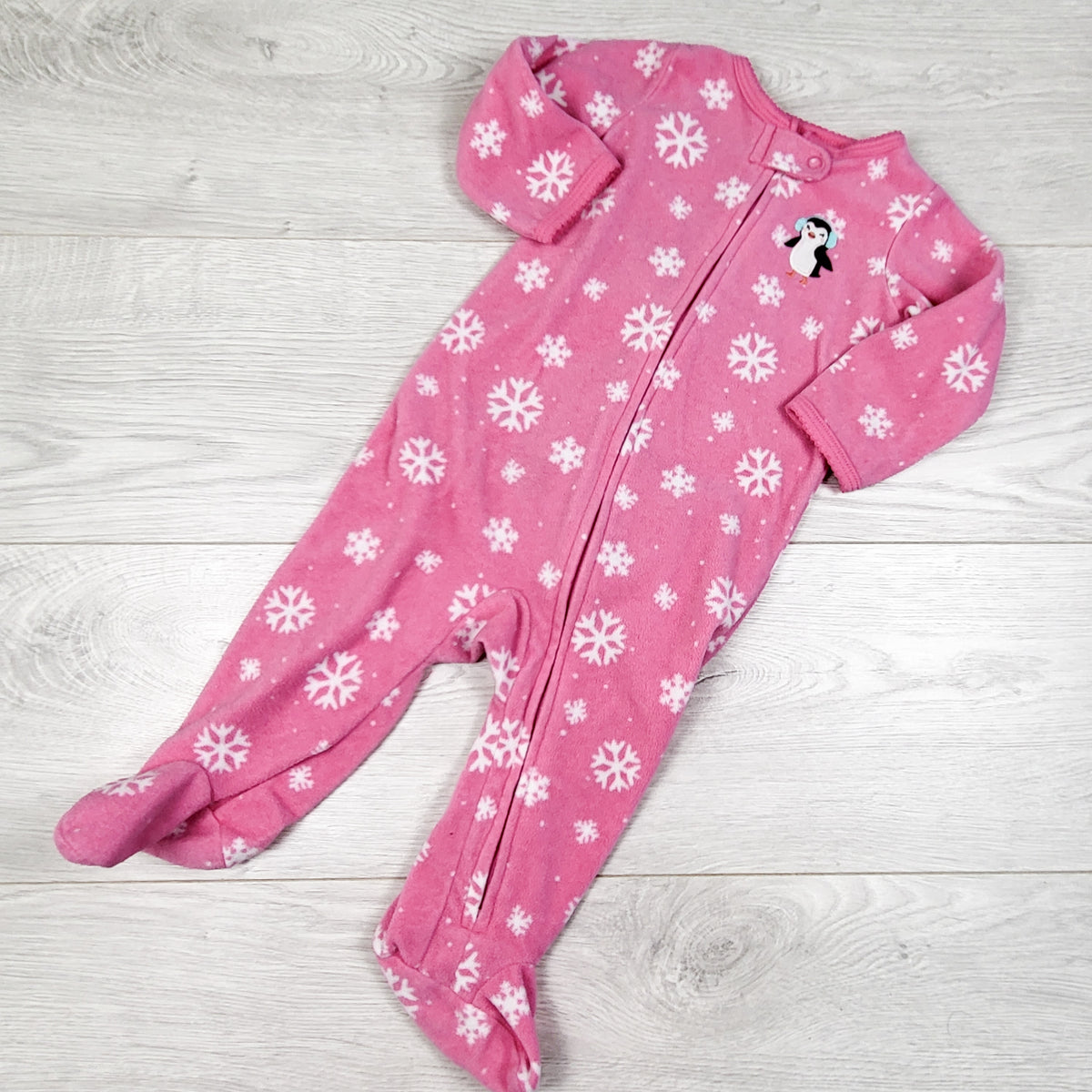 Carters pink snowflake pattern zippered fleece sleeper. Size 9 months