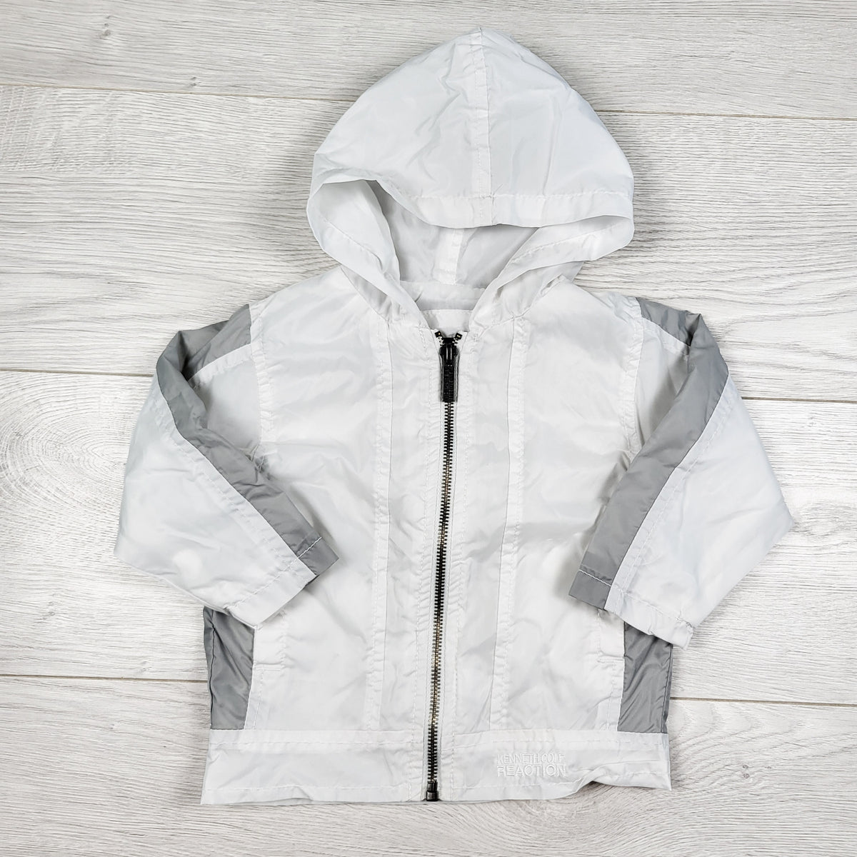Kenneth Cole Reaction white and grey hooded windbreaker jacket. Size 6-9 months