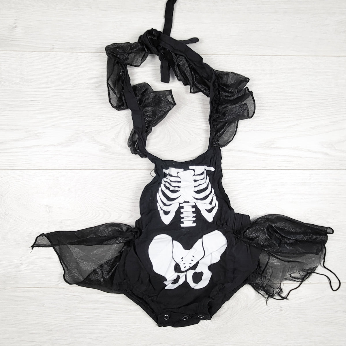 Black skeleton bubble romper. Size 6-12 months