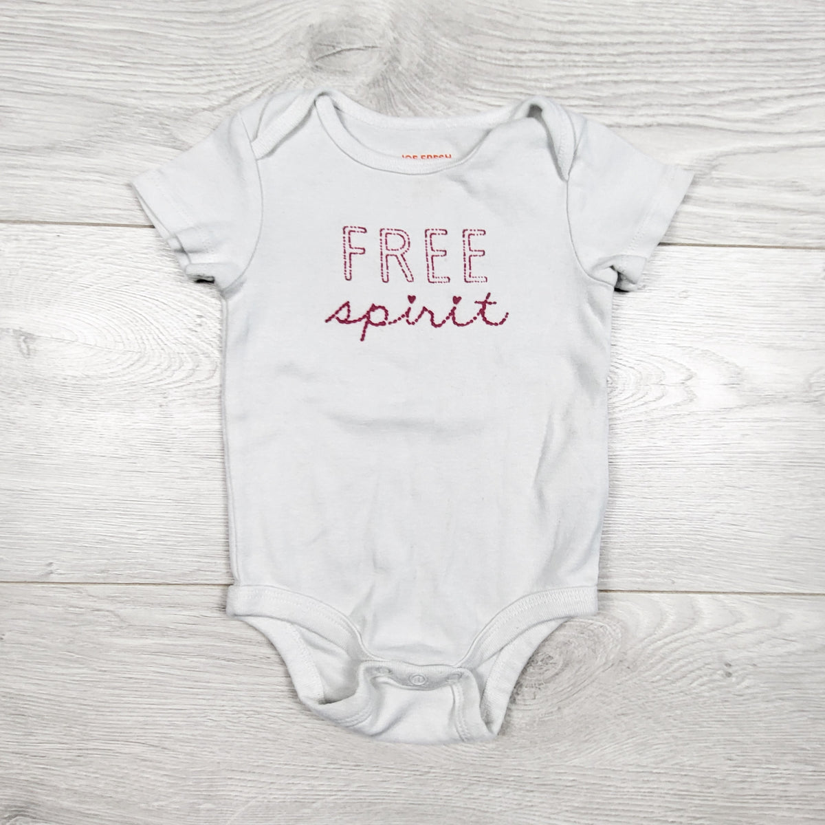 Joe Fresh white "Free Spirit" bodysuit. Size 3-6 months