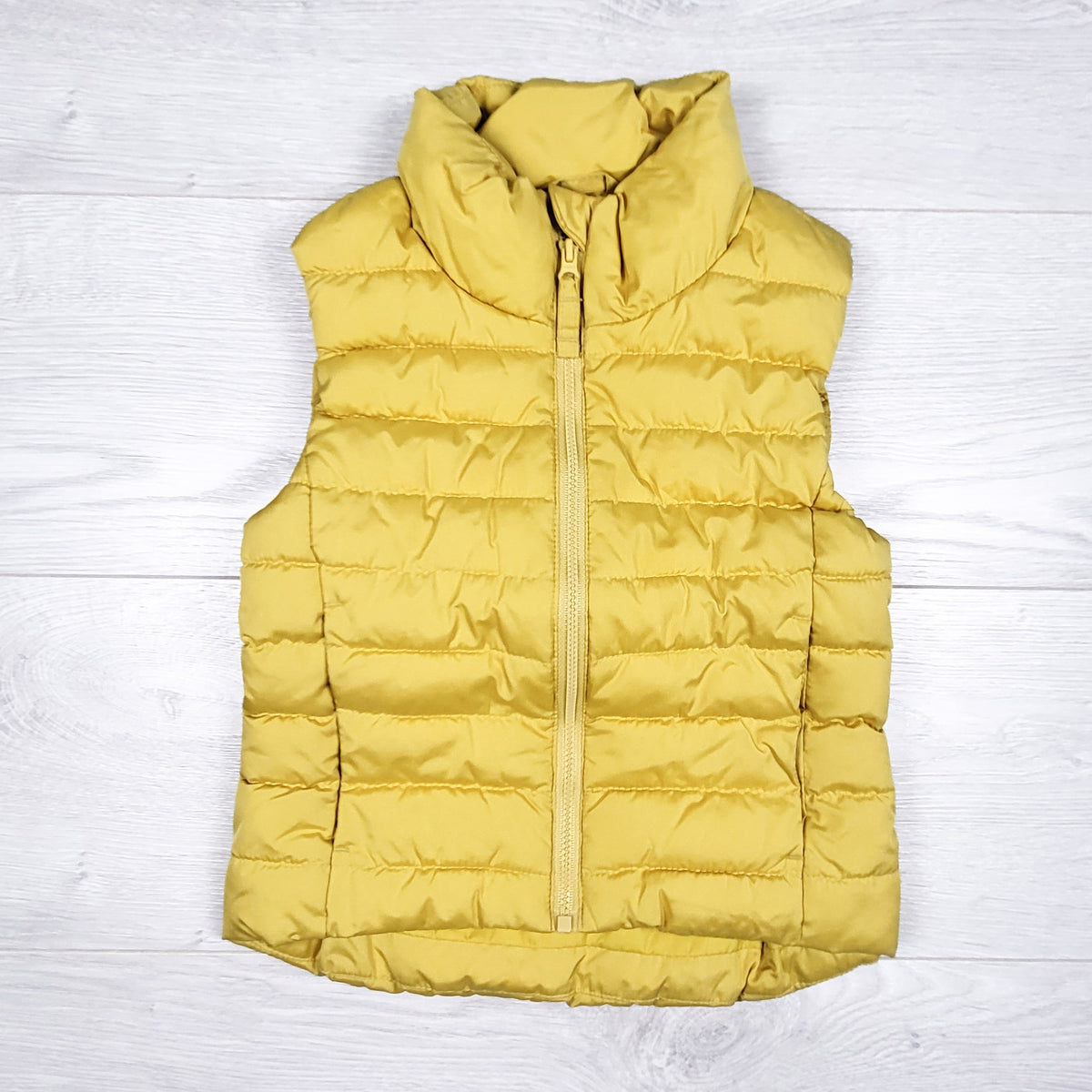 Old Navy yellow puffer vest. Size 5T