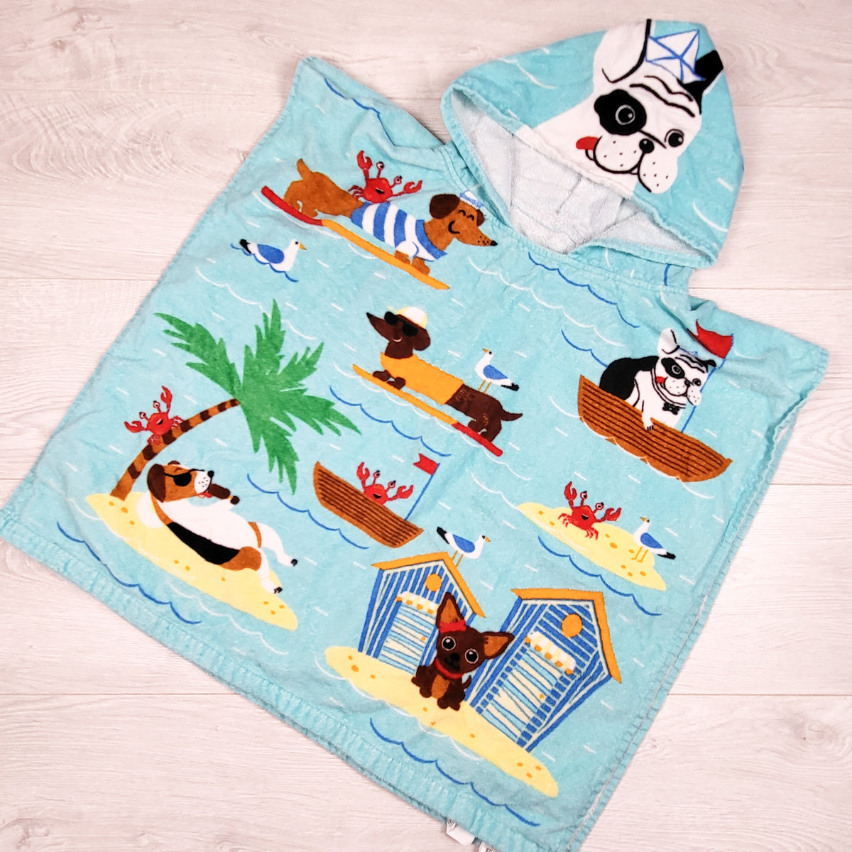 Blue hooded towel with dogs