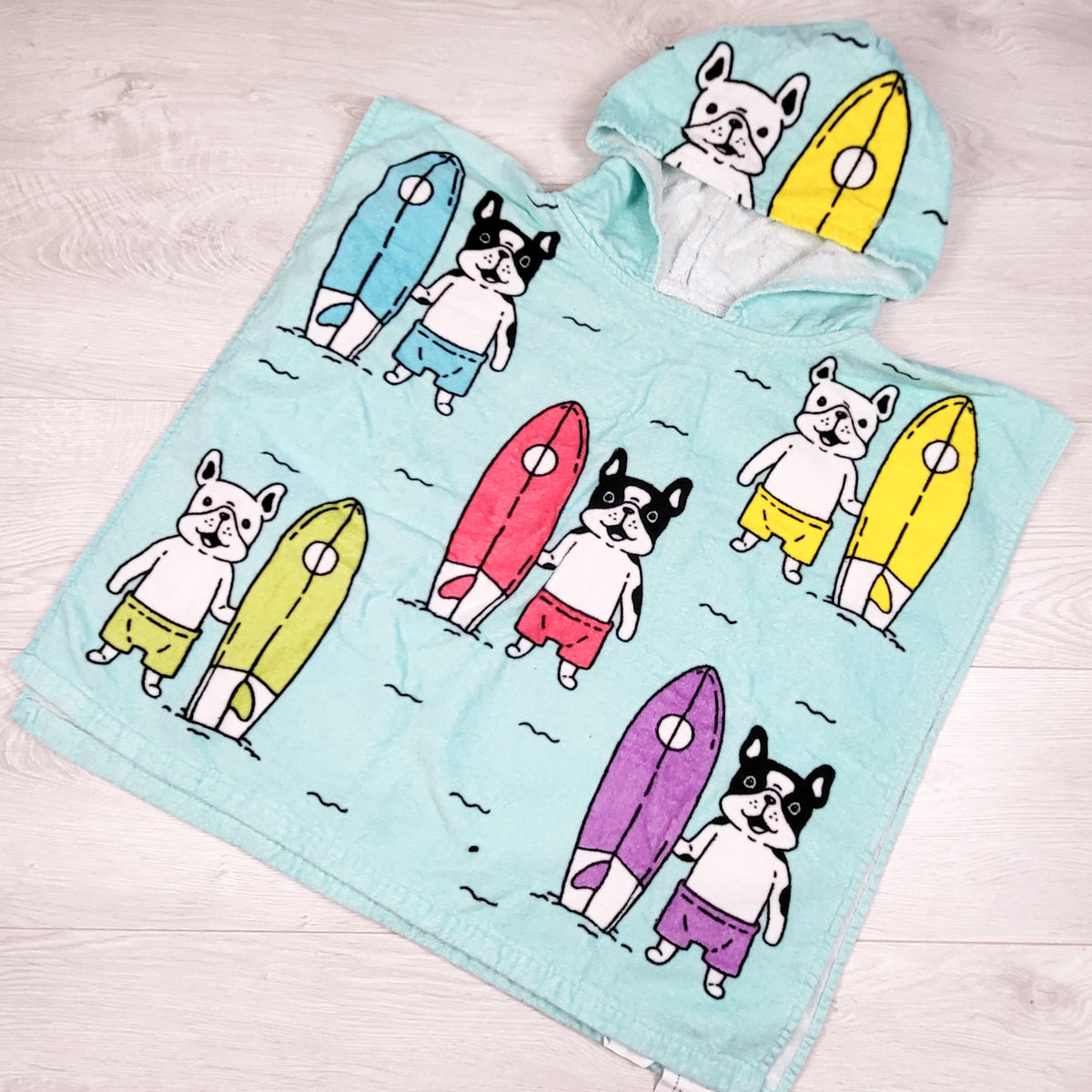 Turquoise hooded towel with surfing dogs