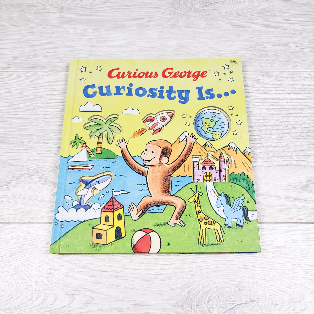 Curious George: Curiosity Is. Hardcover book
