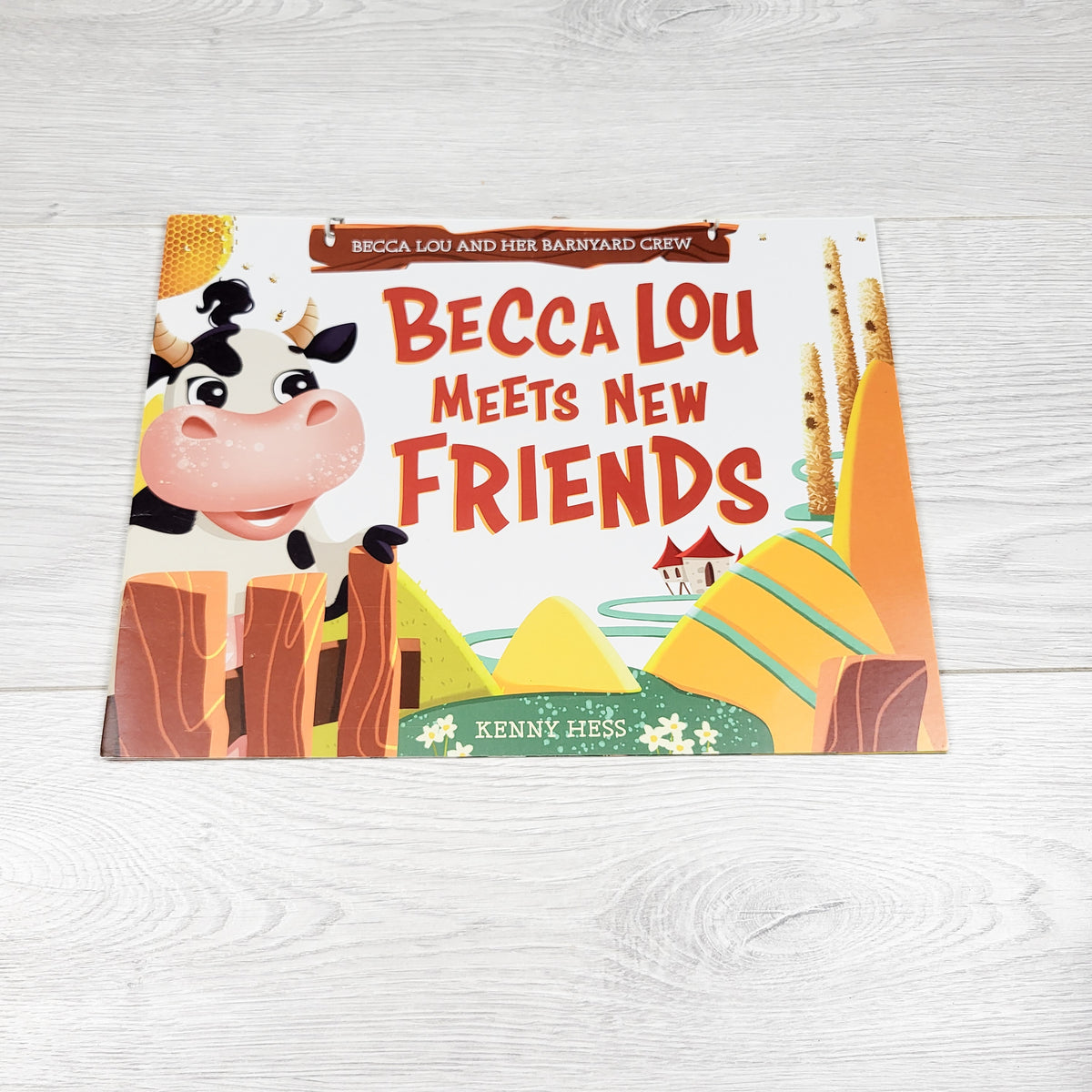 Becca Lou Meets New Friends. Soft cover book