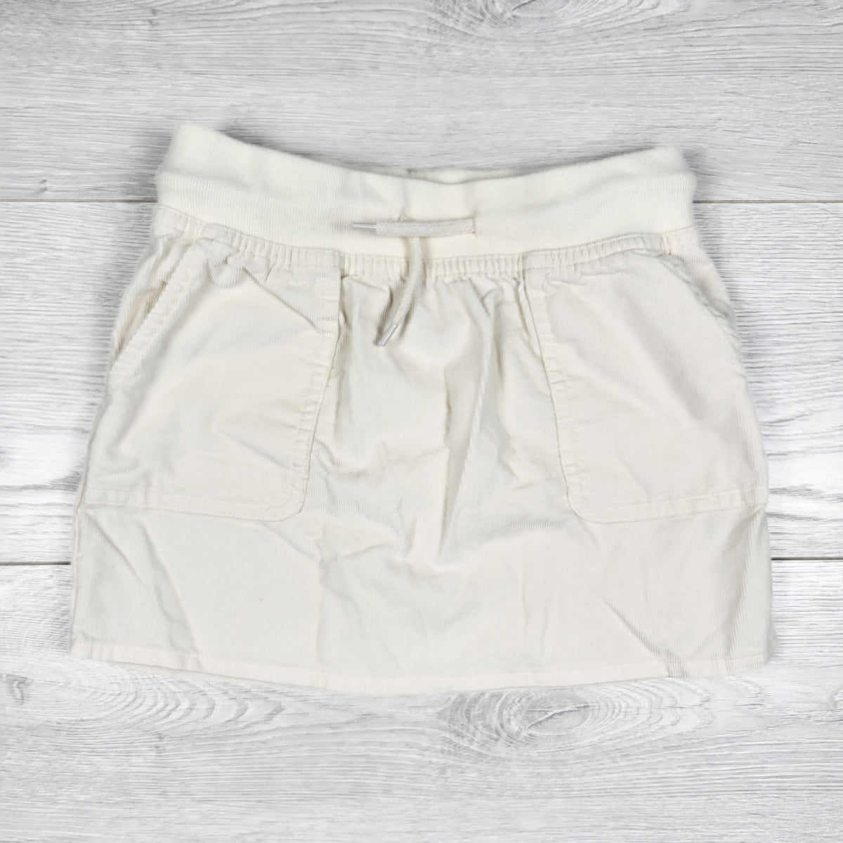 Carters cream coloured corduroy drawstring skirt. Size 6/6X