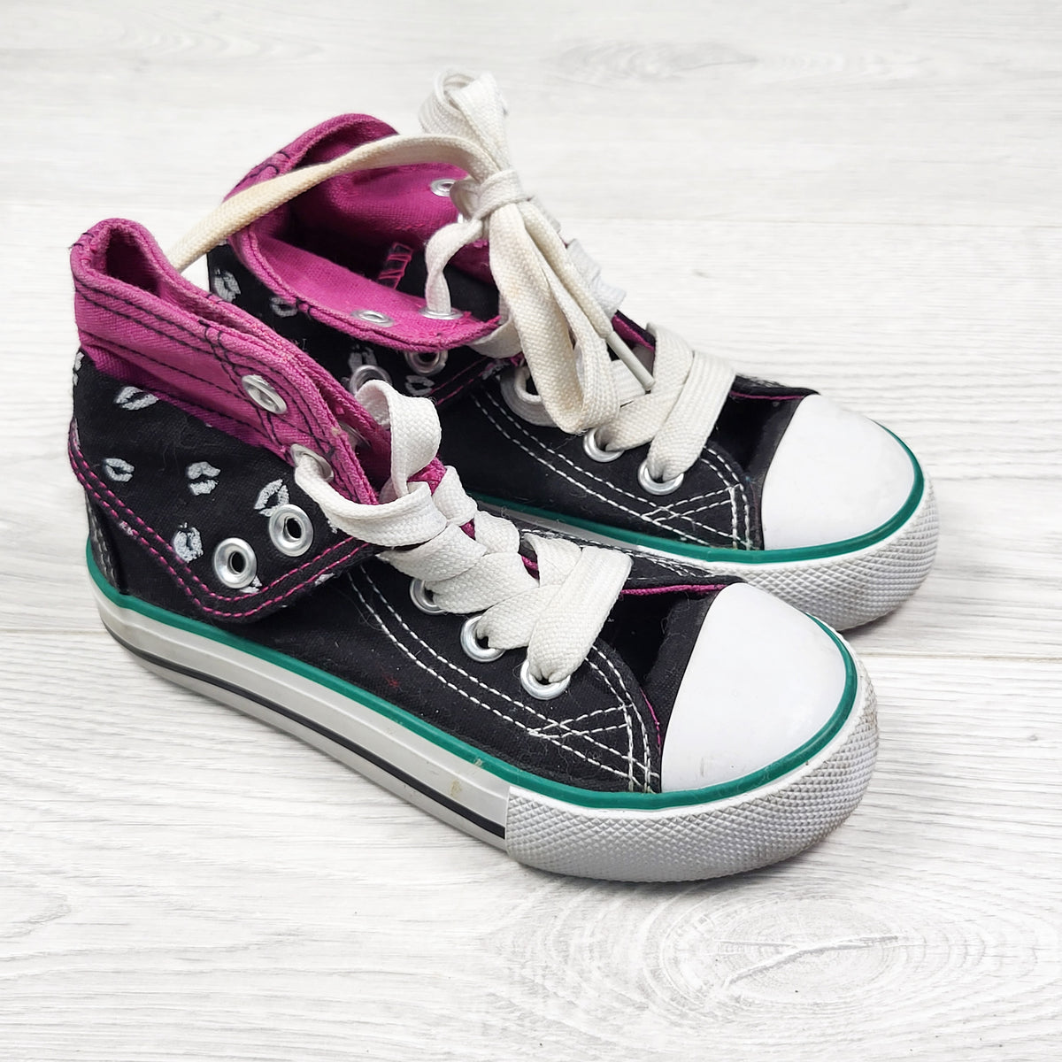 Black foldover hightop shoes. Size 8