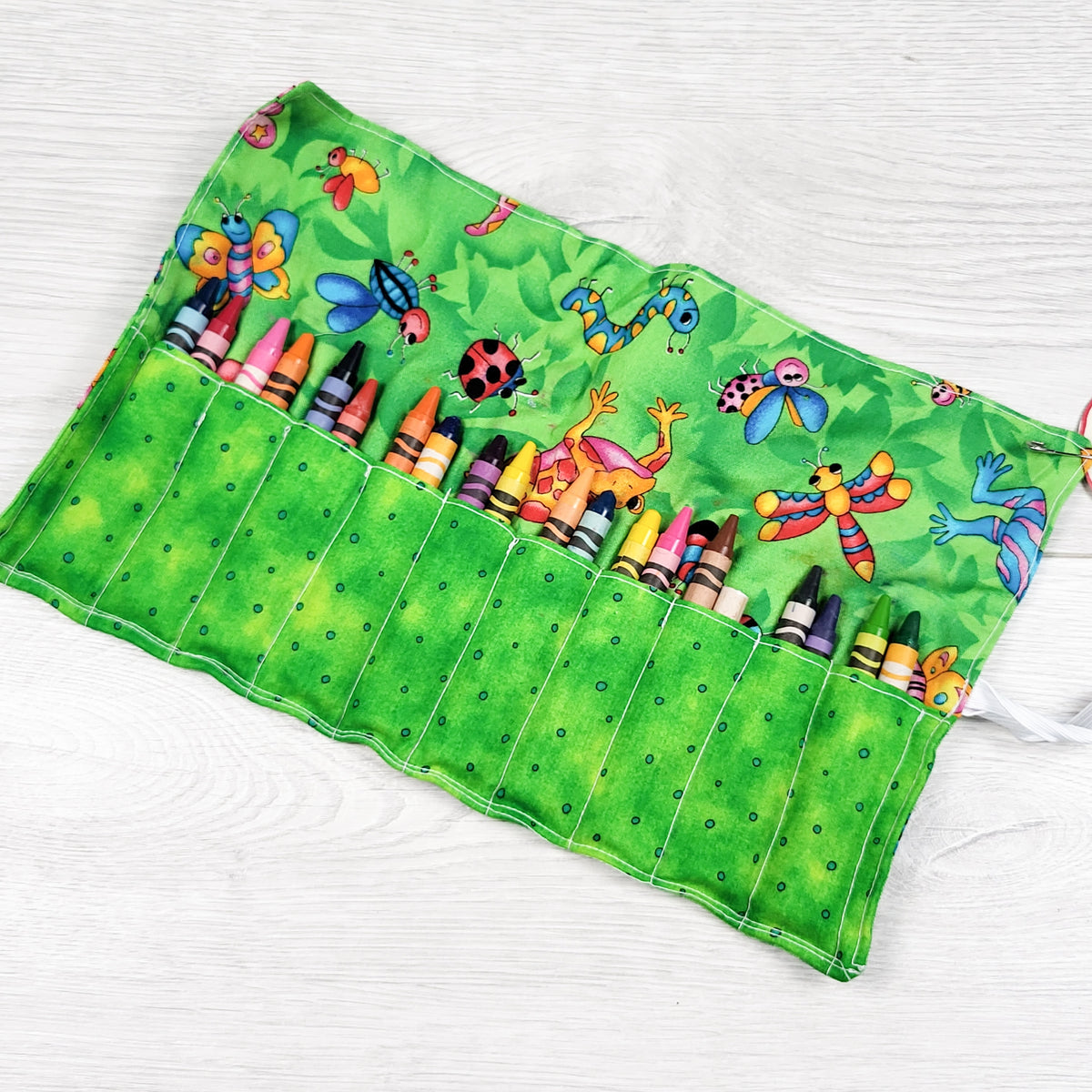 Handmade crayon wrap with crayons (crayons have been used)