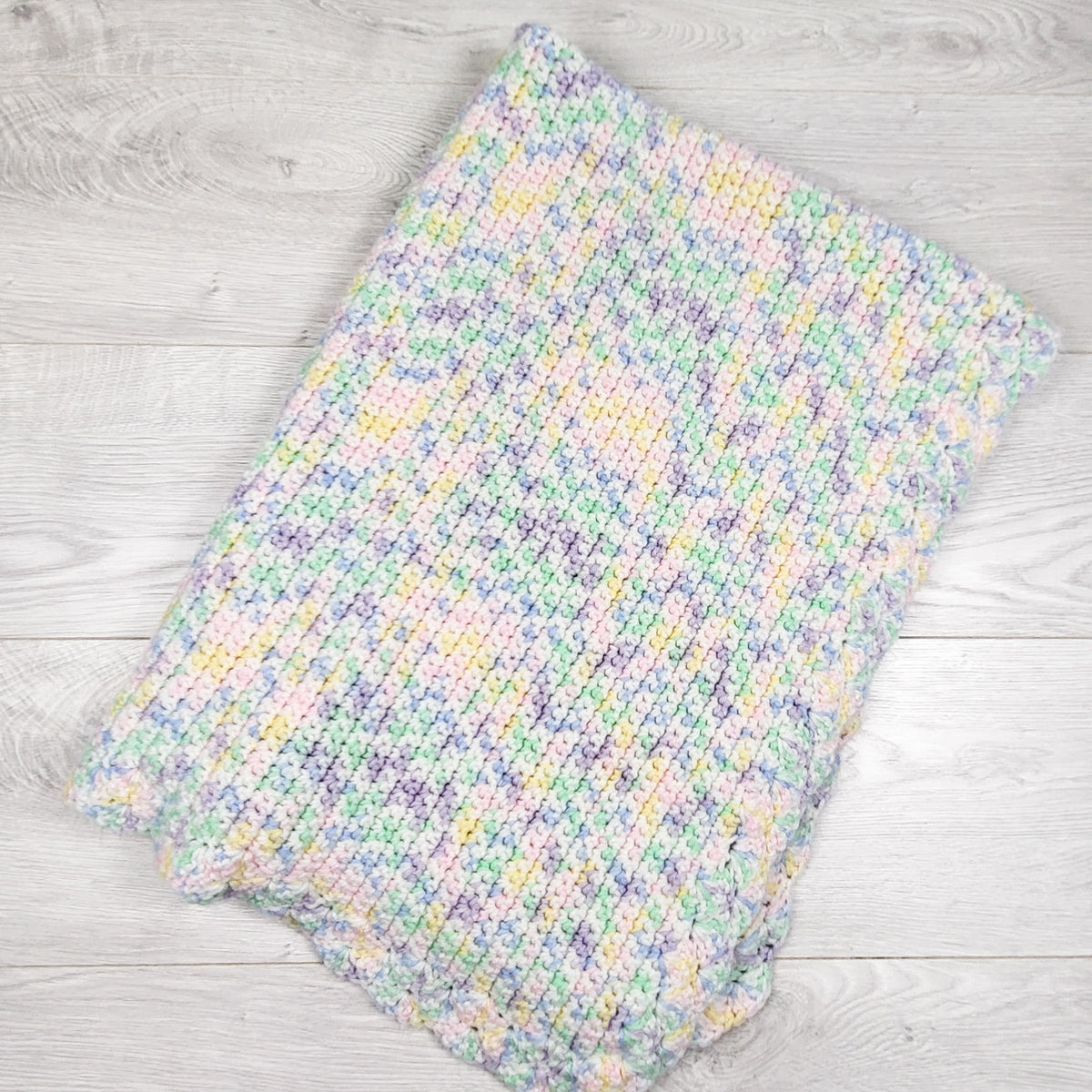 Handmade pastel knit baby blanket
