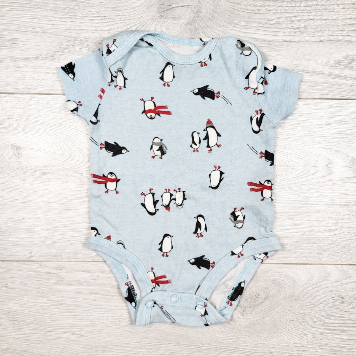 Carters blue penguin print bodysuit. Size 3 months