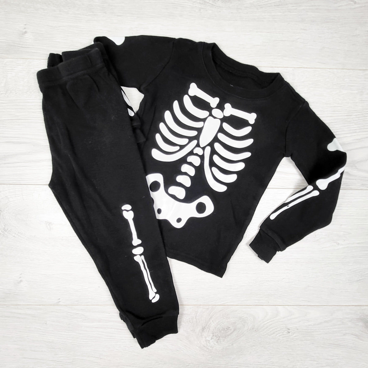 Children's Place black 2pc skeleton PJs. Size 18-24 months